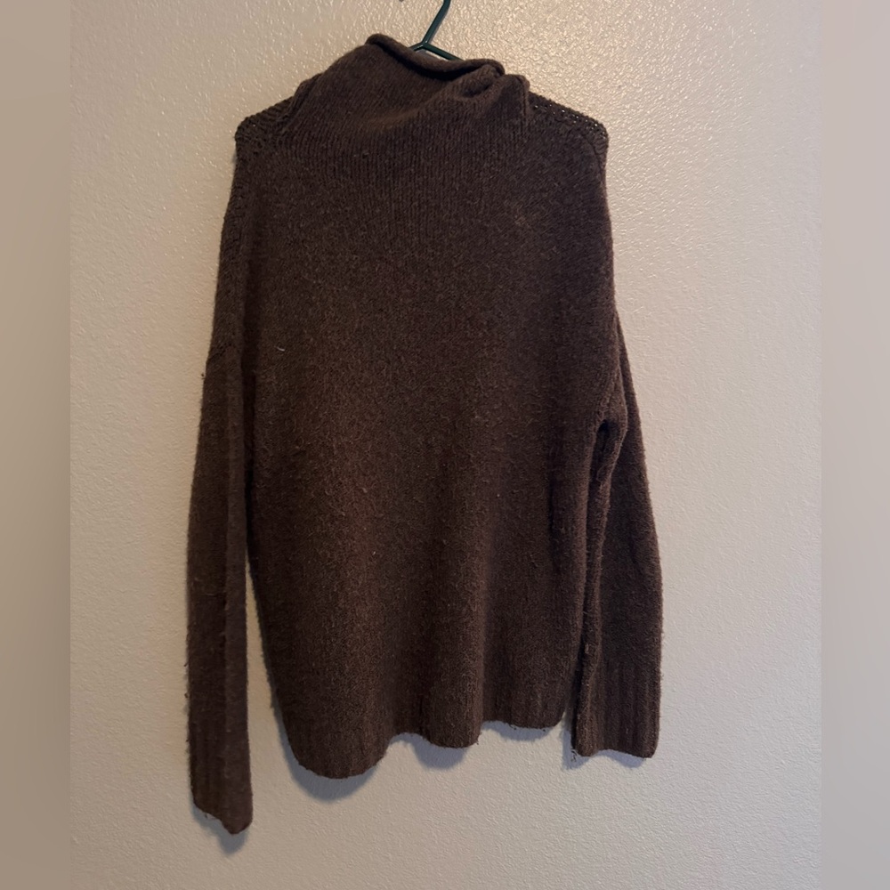 Brown teddy bear sweater